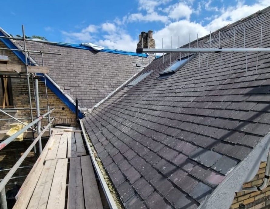 Double Roof Replacement in Natural Slate, Sheffield S7->title 1